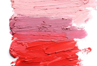 Vuruş ruj beyaz arka planda, üstten görünüm