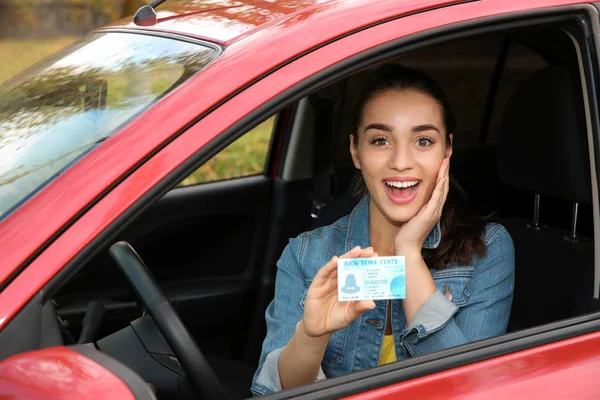 Happy Woman Showing Driving License New Car — Stock Photo, Image