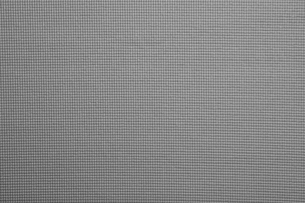 Grey sports mat texture as background, top view