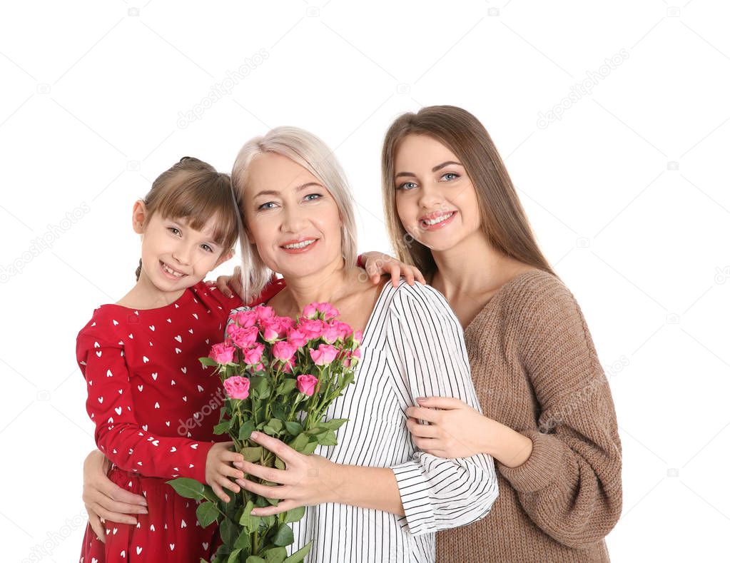 Beautiful mature lady, daughter and grandchild with flowers on white background. Happy Women's Day