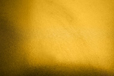 Arka plan olarak düz altın yüzeyinin güzel manzara