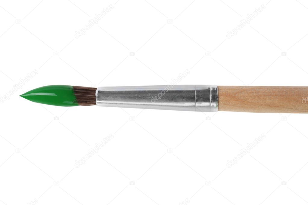 Brush with color paint on white background, top view