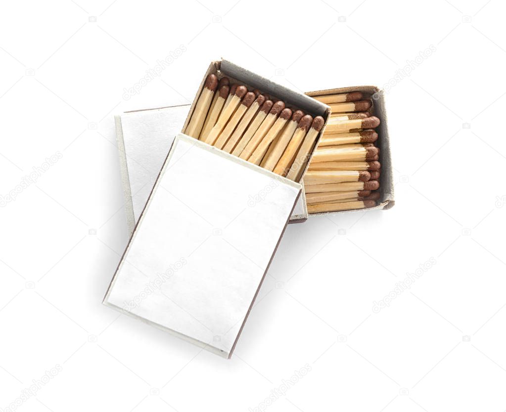 Cardboard boxes with matches on white background, top view. Space for design