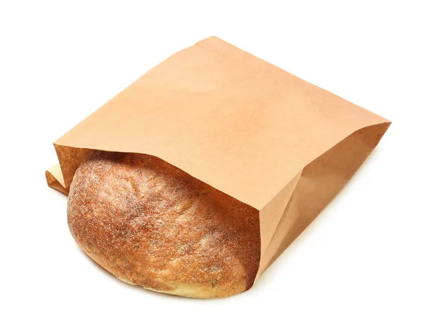 Papírový pytel s chlebem na bílém pozadí. Prostor pro design — Stock fotografie
