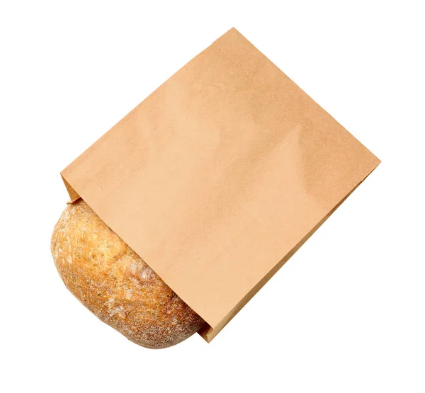 Паперовий мішок з хлібом на білому тлі, вид зверху. Простір для дизайну — стокове фото