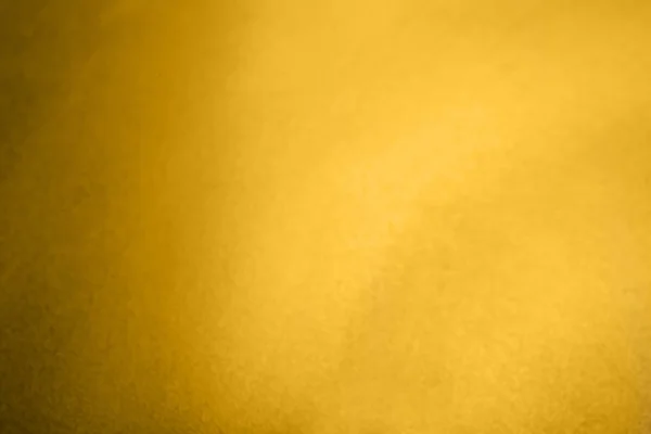 模糊的纯金色表面作为背景 — 图库照片