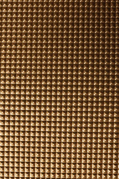 Textured golden surface as background, top view — Stock Photo, Image