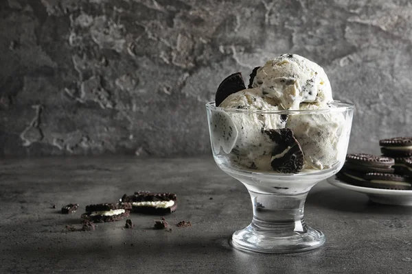 Bowl of chocolate cookies ice cream on table. Space for text — Stock Photo, Image