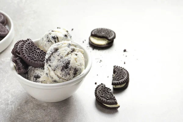 Bowl of chocolate cookies ice cream on table. Space for text — Stock Photo, Image