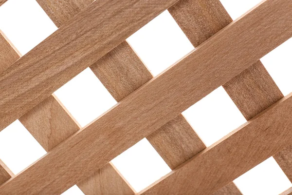 Tablones de madera cruzados sobre fondo blanco, primer plano —  Fotos de Stock