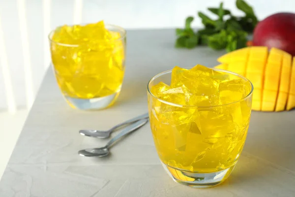 Composition with mango jelly in glass on  table. Space for text — Stock Photo, Image