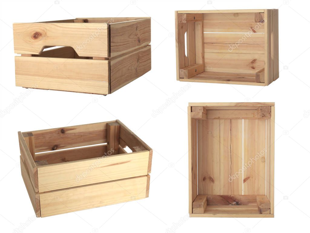 Set of empty wooden crates on white background