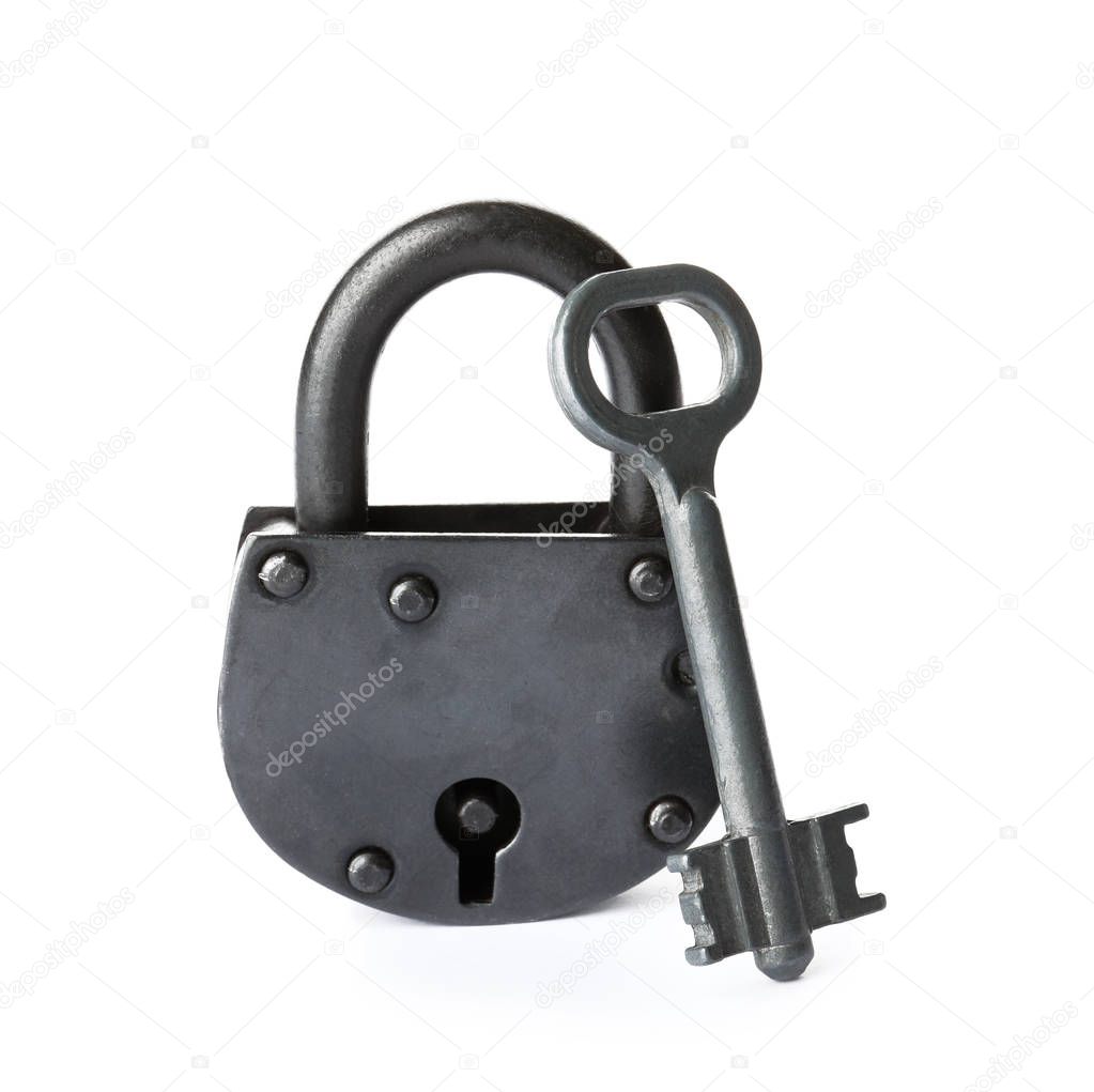 Key and vintage padlock on white background