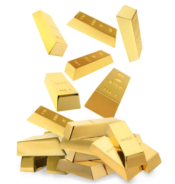 Brillantes barras de oro cayendo en un montón sobre fondo blanco —  Fotos de Stock