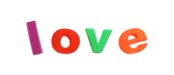 Word LOVE of magnetic letters on white background, top view — Stock Photo, Image
