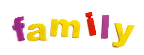 Word FAMILY of magnetic letters on white background, top view — Stock Photo, Image