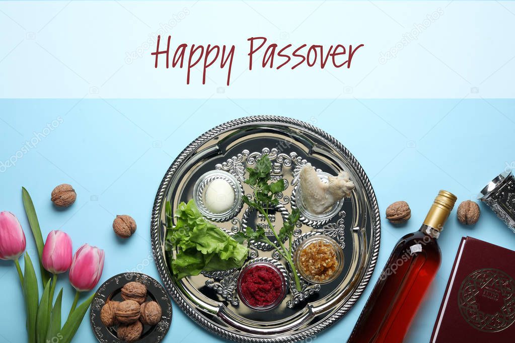 Flat lay composition of symbolic Pesach items on color background. Happy Passover