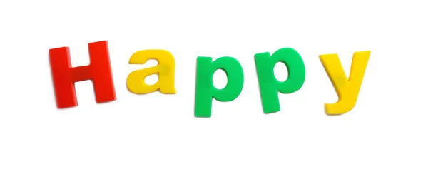 Palavra HAPPY de letras magnéticas sobre fundo branco, vista superior — Fotografia de Stock