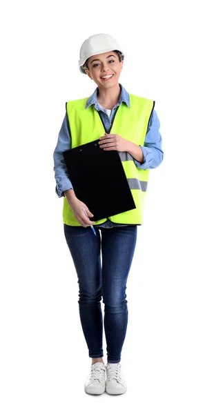 Female industrial engineer in uniform with clipboard on white background. Safety equipment — Stock Photo, Image