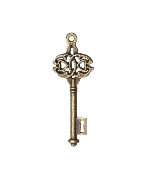 Bronze vintage ornamentado chave no fundo branco — Fotografia de Stock