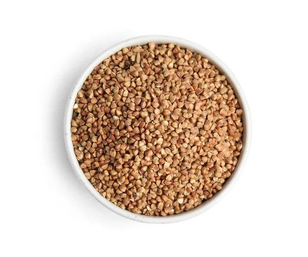 Cuenco con trigo sarraceno sin cocer sobre fondo blanco, vista superior — Foto de Stock