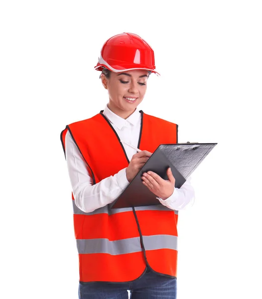 Ingeniera industrial en uniforme con portapapeles sobre fondo blanco. Equipo de seguridad —  Fotos de Stock