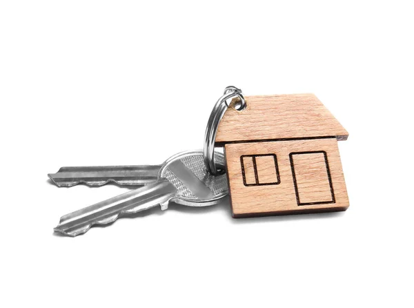 Ház kulcsok, csecsebecse, fehér háttér — Stock Fotó