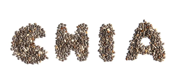 Palabra CHIA hecha de semillas sobre fondo blanco, vista superior — Foto de Stock