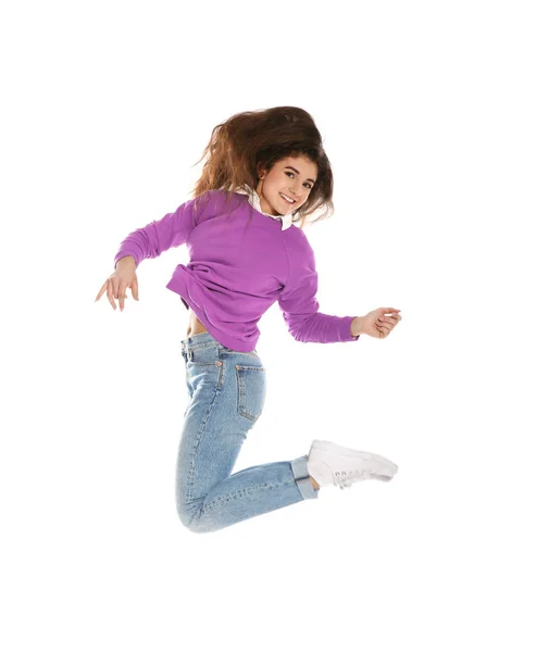 Vacker ung kvinna i snygga kläder hoppning på vit bakgrund — Stockfoto