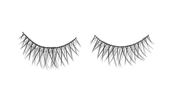 Beautiful pair of false eyelashes on white background, top view — Stock Photo, Image