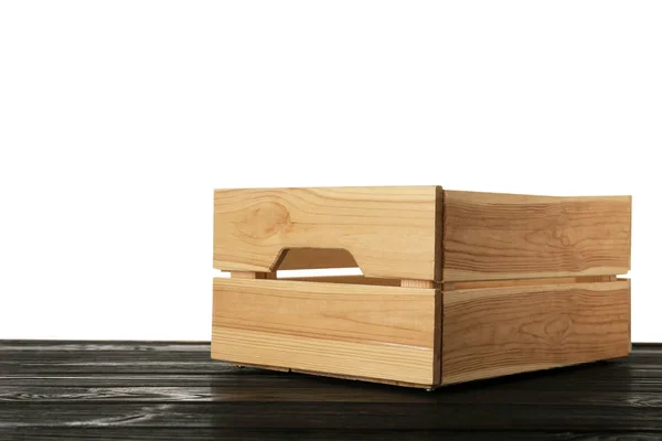 Lege rustieke houten kist op tafel tegen witte achtergrond. Ruimte voor tekst — Stockfoto