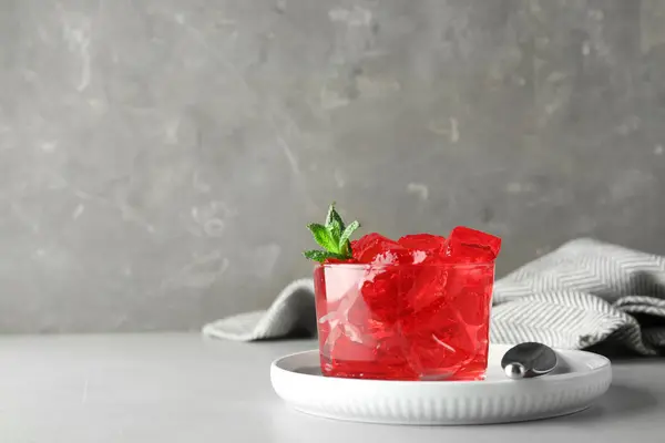 Delicious red jelly in glass on table. Space for text — Stock Photo, Image