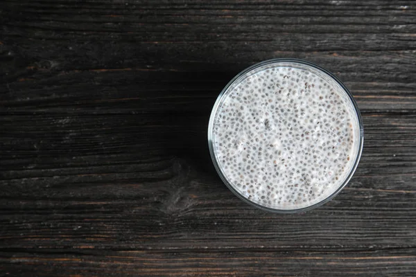 Dessert kommetje smakelijke chia zaad pudding op tafel, bovenaanzicht. Ruimte voor tekst — Stockfoto