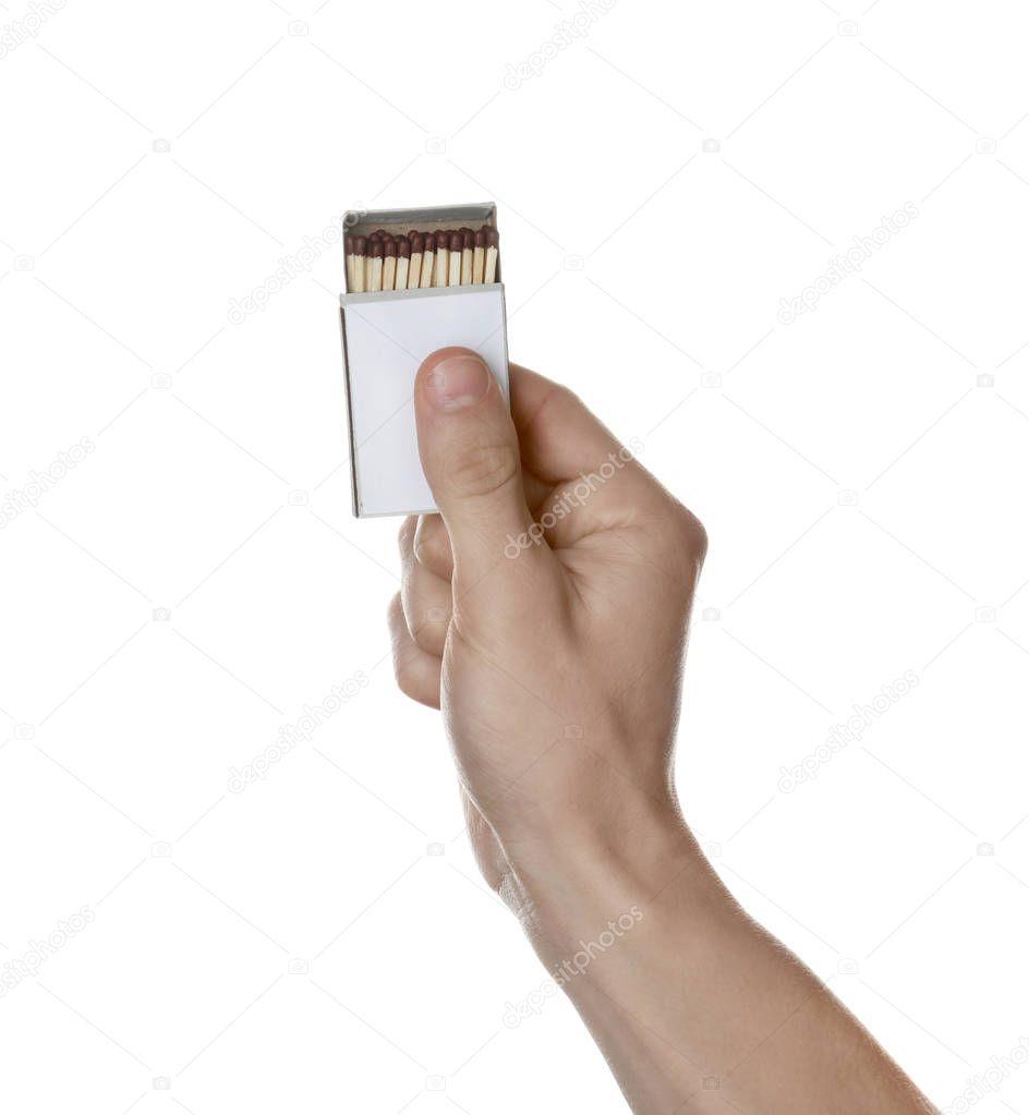 Man holding box with matches on white background, closeup