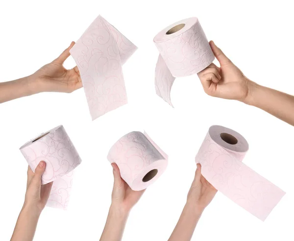 Γυναίκες κατέχουν ρολά χαρτιού τουαλέτας σε λευκό φόντο, κοντινό πλάνο — Φωτογραφία Αρχείου