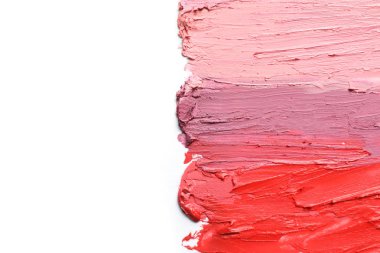 Vuruş ruj beyaz arka planda, üstten görünüm