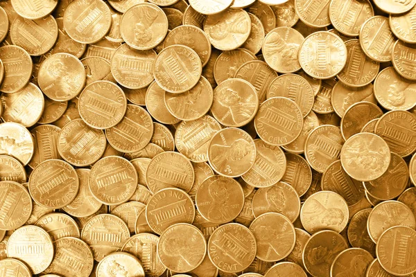 Many shiny USA one cent coins as background, top view — Stock Photo, Image