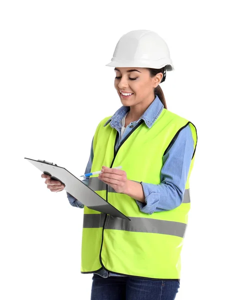 Ingeniera industrial en uniforme con portapapeles sobre fondo blanco. Equipo de seguridad —  Fotos de Stock