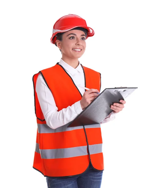 Engenheira industrial feminina em uniforme com prancheta sobre fundo branco. Equipamento de segurança — Fotografia de Stock