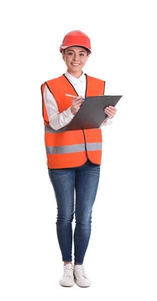 Female industrial engineer in uniform with clipboard on white background. Safety equipment — Stock Photo, Image
