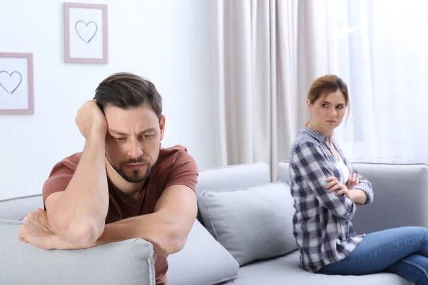 Couple ignoring each other after argument in living room. Relationship problems — Stock Photo, Image