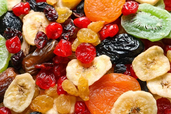 Diversi frutti secchi come sfondo, primo piano. Stile di vita sano — Foto Stock