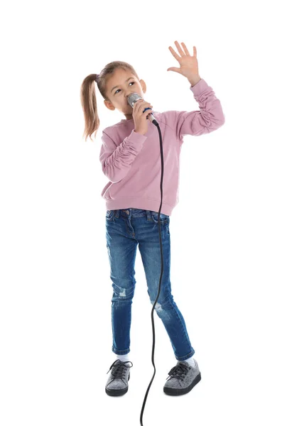 Menina engraçada bonito com microfone no fundo branco — Fotografia de Stock