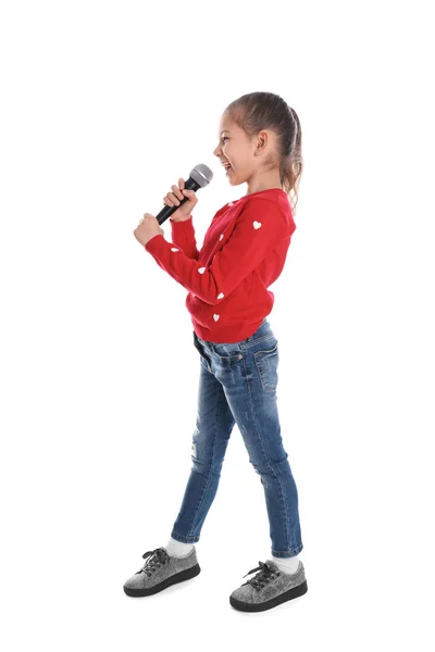 Menina engraçada bonito com microfone no fundo branco — Fotografia de Stock