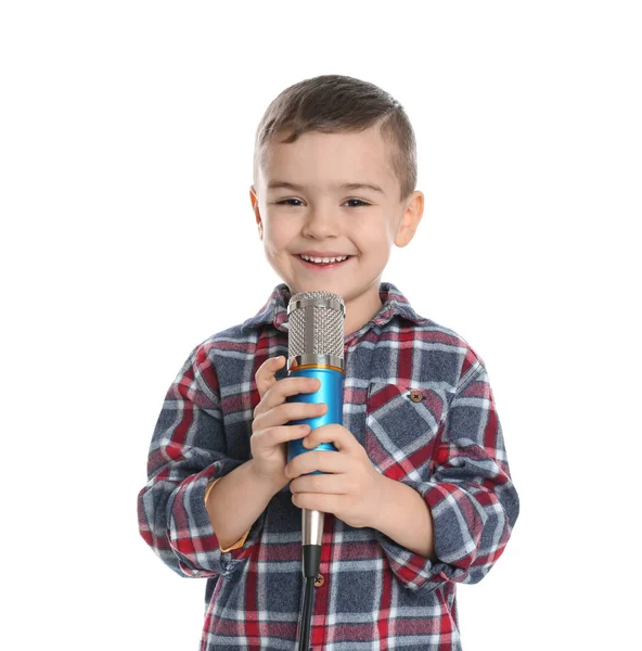 Garoto engraçado bonito com microfone no fundo branco — Fotografia de Stock