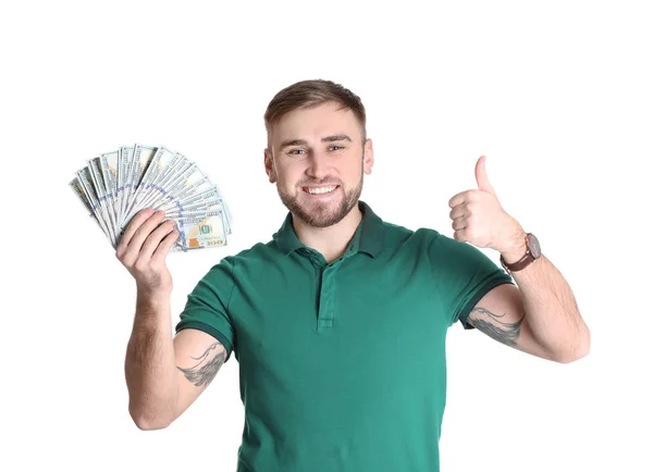 Portrait of young man holding money banknotes on white background — Stock Photo, Image