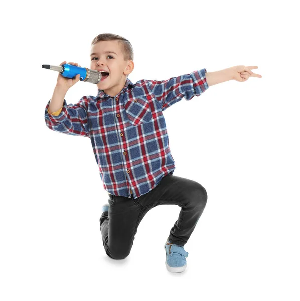 Leuke, grappige jongen met de microfoon op witte achtergrond — Stockfoto