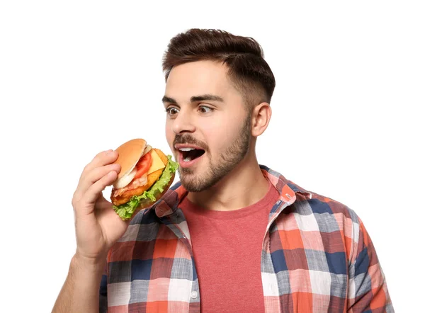 Stilig man äta läckra burger isolerad på vit — Stockfoto