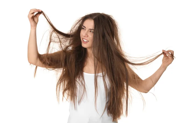 Emotional woman with tangled hair on white background — Stock Photo, Image