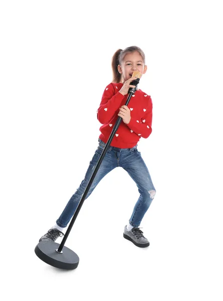 Menina engraçada bonito com microfone no fundo branco — Fotografia de Stock